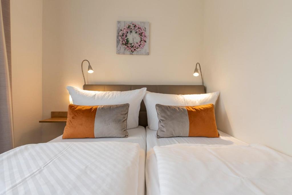 Letto o letti in una camera di Hotel Bamberger Hof, garni