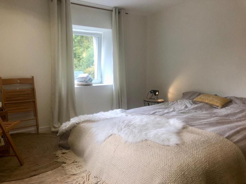 Postel nebo postele na pokoji v ubytování Accomodatie in Villa Werschmatt