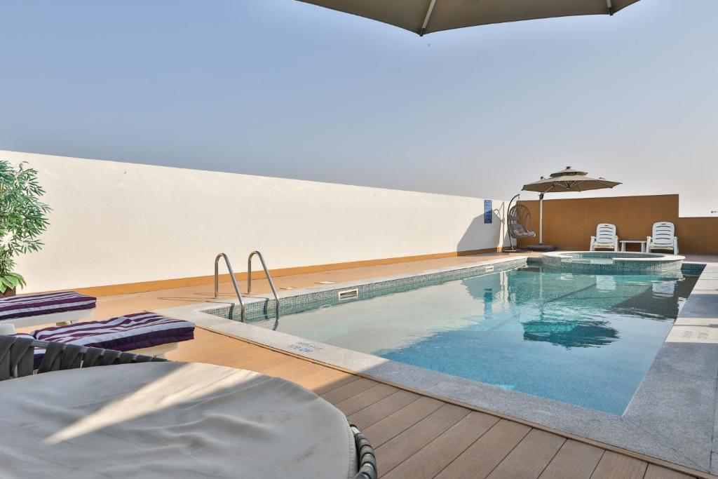 Bazén v ubytování Royal Mansoura Residence Hotel nebo v jeho okolí