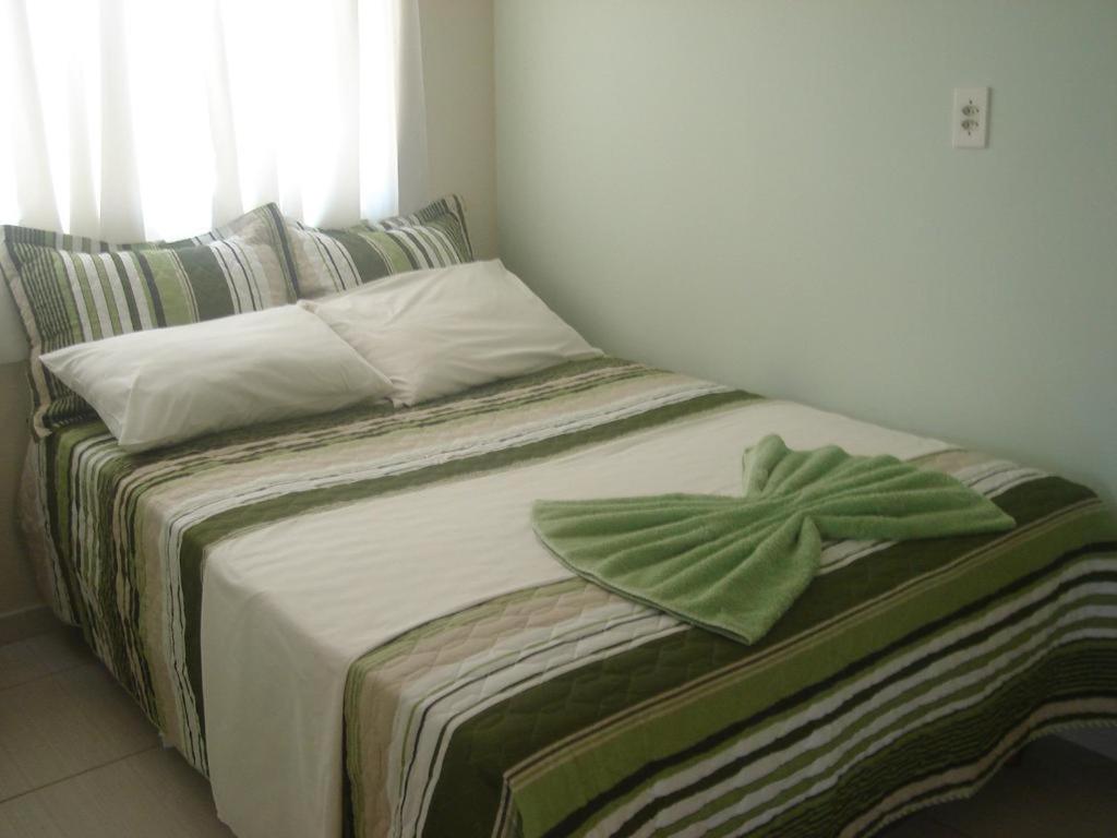 Postel nebo postele na pokoji v ubytování Hotel Alvorada