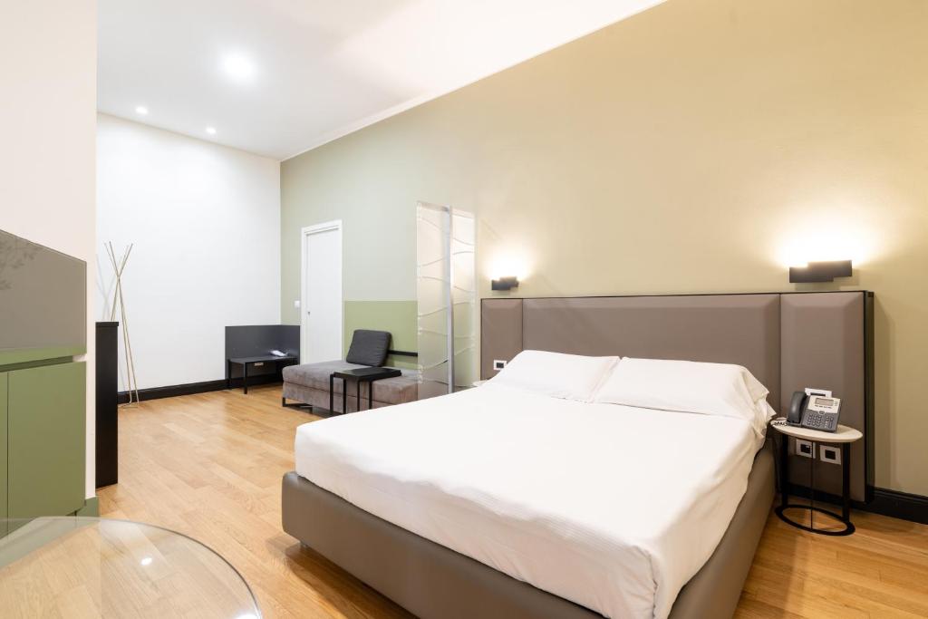 Postel nebo postele na pokoji v ubytování Castello Guest House Milano