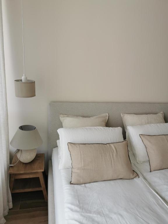 Posteľ alebo postele v izbe v ubytovaní HEARTH HILL VIEW APARTMENT