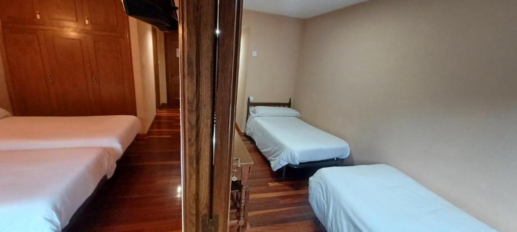 Postel nebo postele na pokoji v ubytování El Caserío