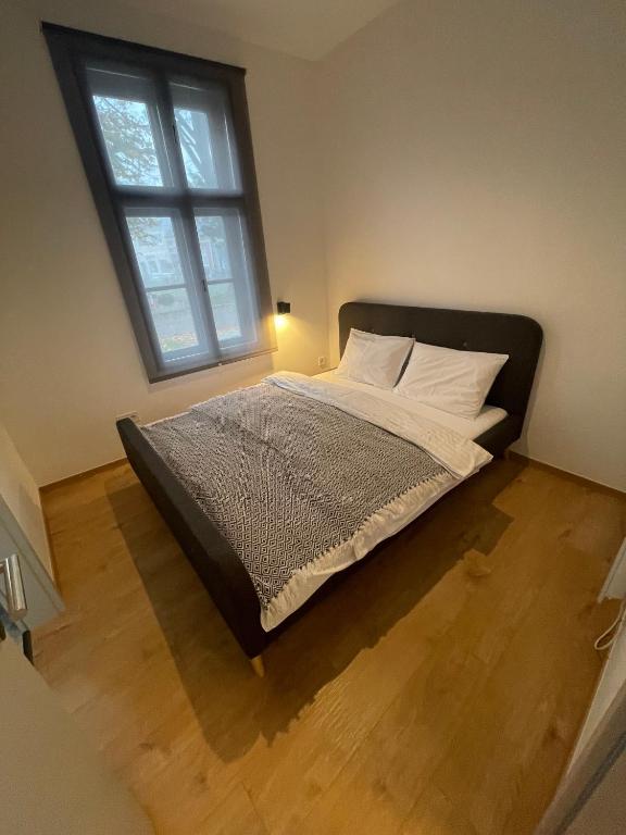 Postel nebo postele na pokoji v ubytování Dream Apartman