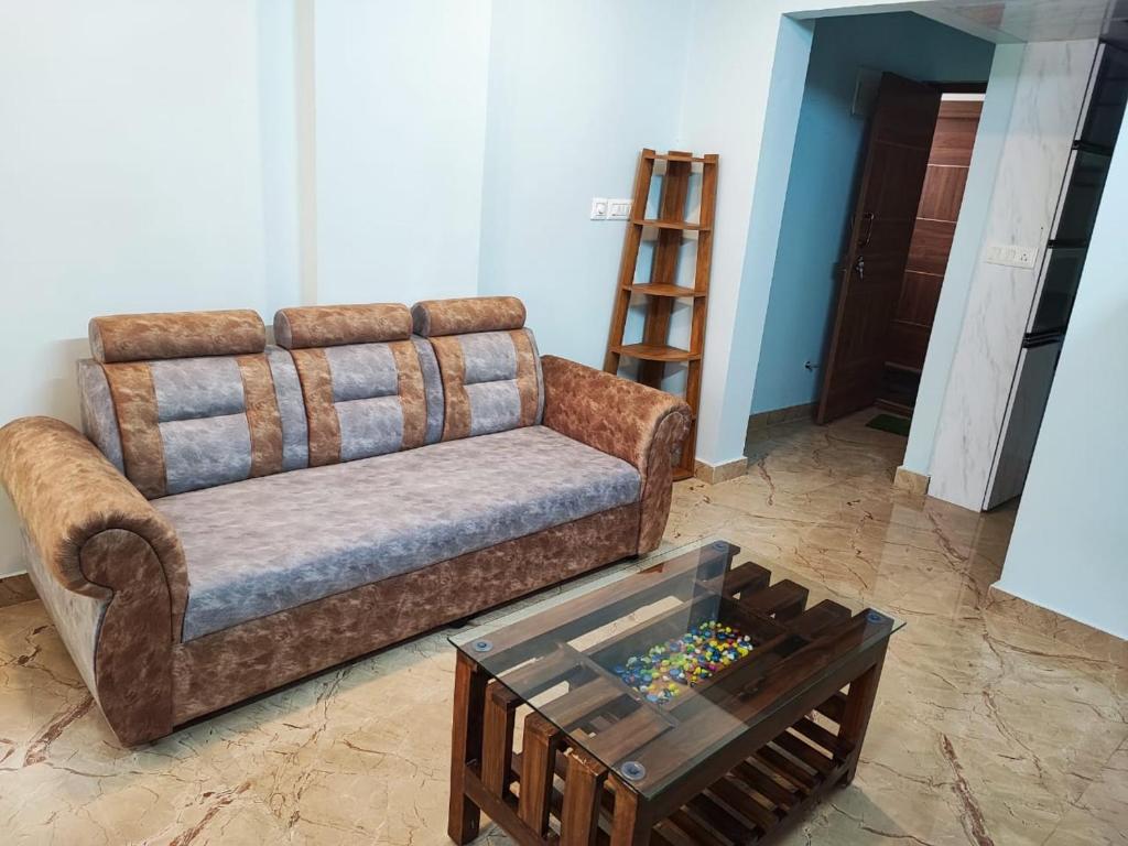 Posezení v ubytování Kamadhenu Residency Homestay & Service Apartment Coorg Madikeri