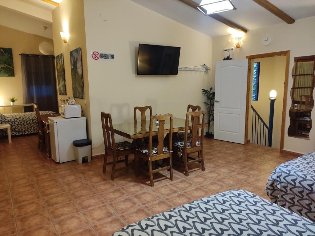 Posteľ alebo postele v izbe v ubytovaní Apartamento privado con piscina y jardin compartidos.