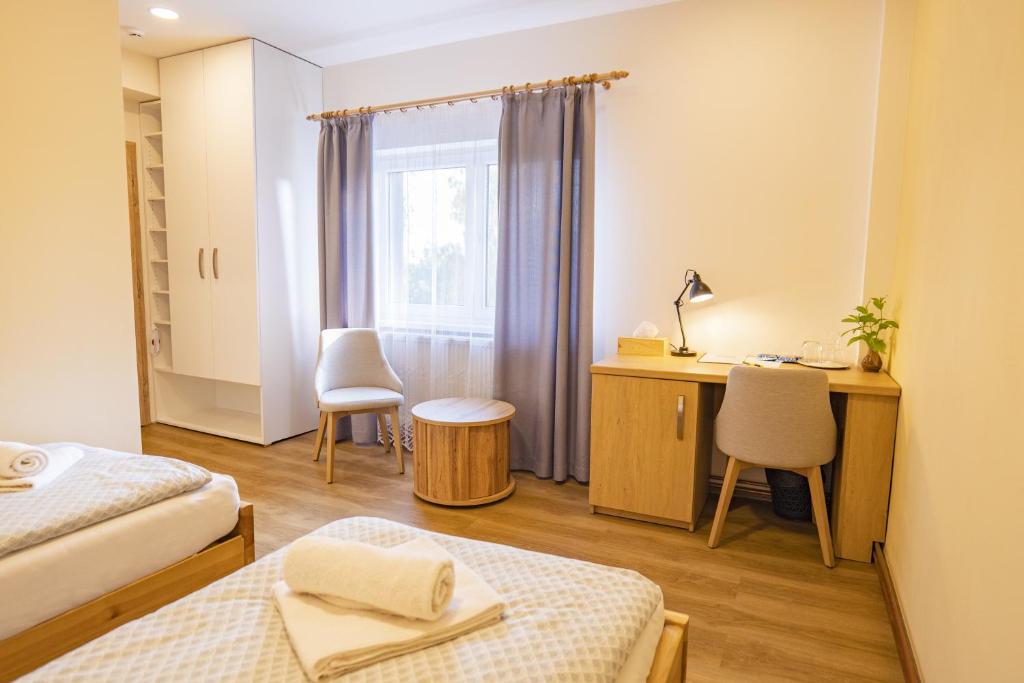 Postel nebo postele na pokoji v ubytování Penzion Harmony Javorník