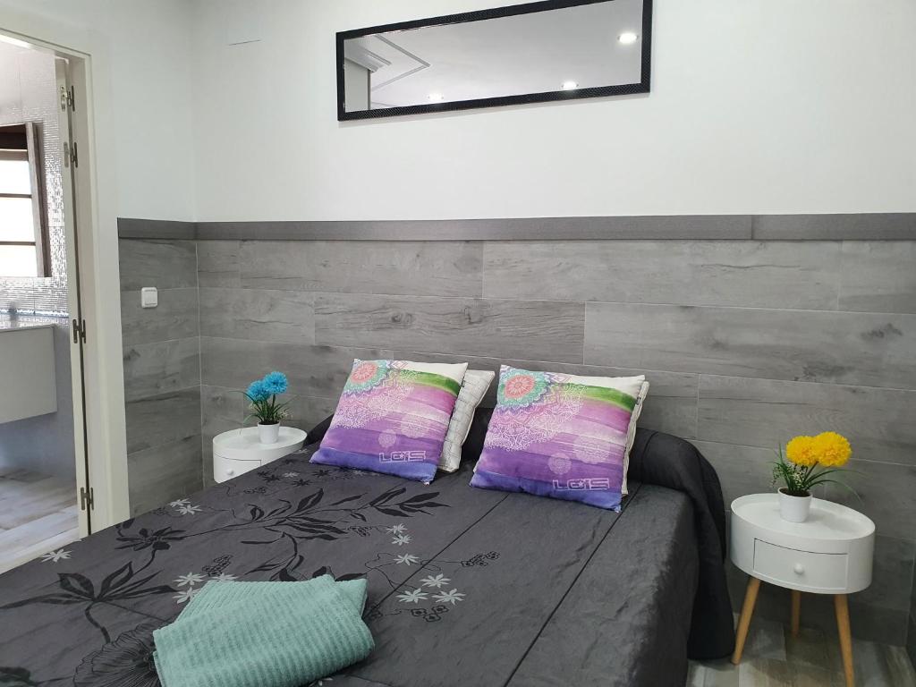 Postel nebo postele na pokoji v ubytování Albergue Piedad