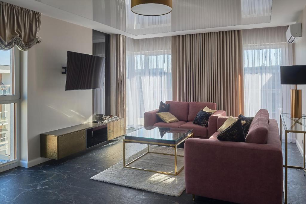Posezení v ubytování Apartament Primavera 3 MINI SPA Komfort dla grup biznesowych , rodzin ,osób indywidualnych