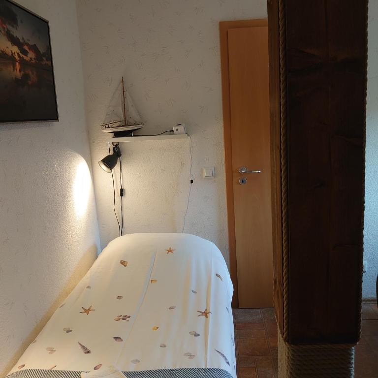 Postel nebo postele na pokoji v ubytování De Cyprian Bed & Breakfast