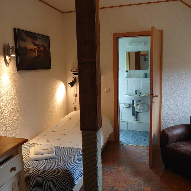 Postel nebo postele na pokoji v ubytování De Cyprian Bed & Breakfast
