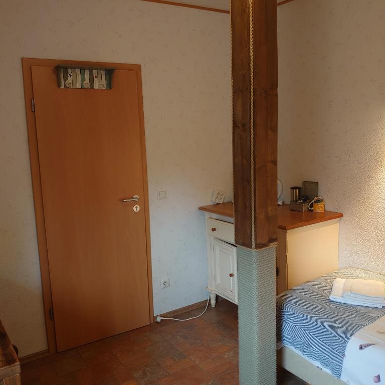 Postel nebo postele na pokoji v ubytování De Cyprian Bed & Breakfast