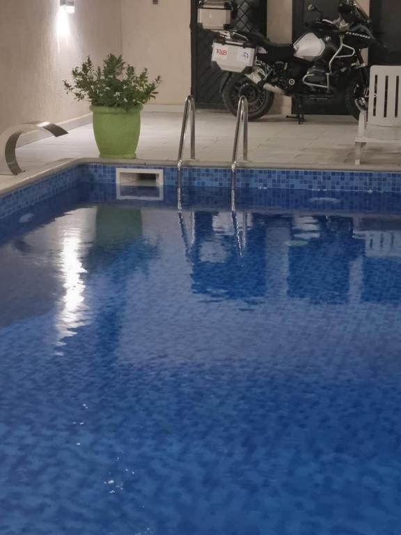 Bazén v ubytování CasaHouse Apparts nebo v jeho okolí