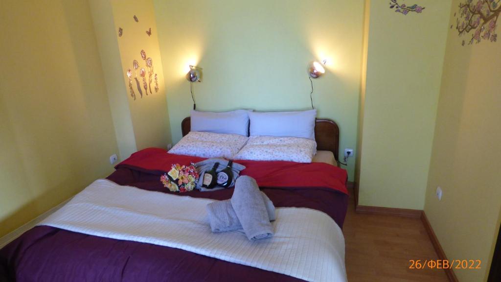 Postel nebo postele na pokoji v ubytování Villa Georgius
