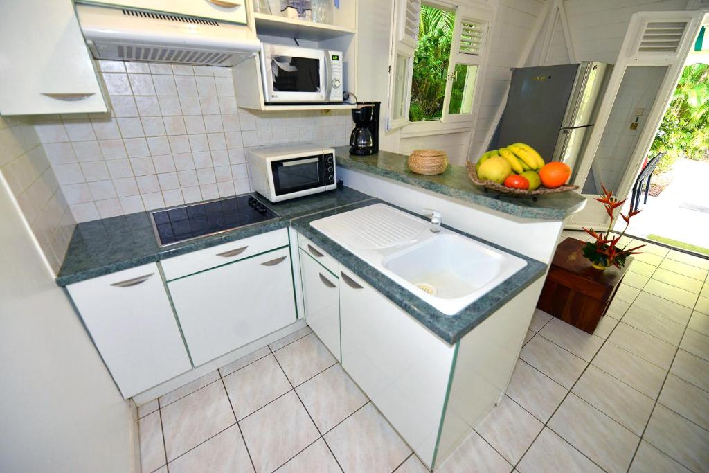 Kuchyň nebo kuchyňský kout v ubytování Sur la route des épices - Location villas avec piscine et jacuzzi