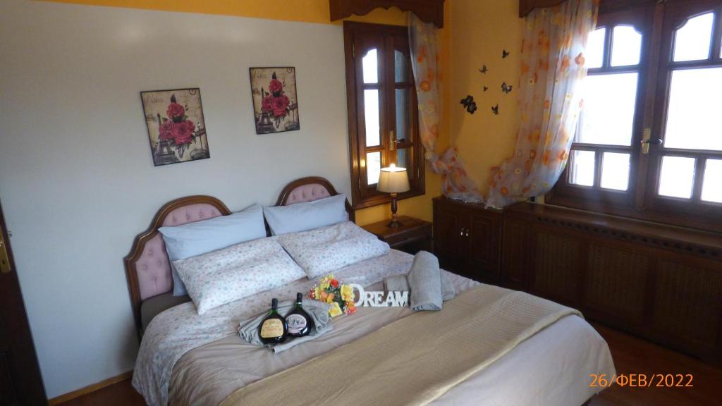 Postel nebo postele na pokoji v ubytování Villa Georgius