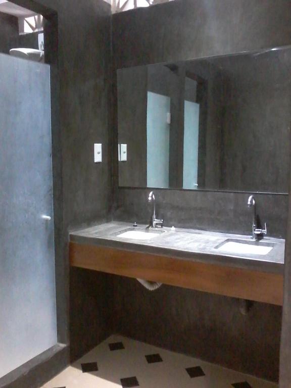 Koupelna v ubytování Pousada e Hostel Chez Marianne