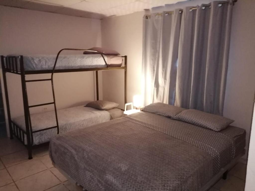 Letto o letti in una camera di Gaia Lodge