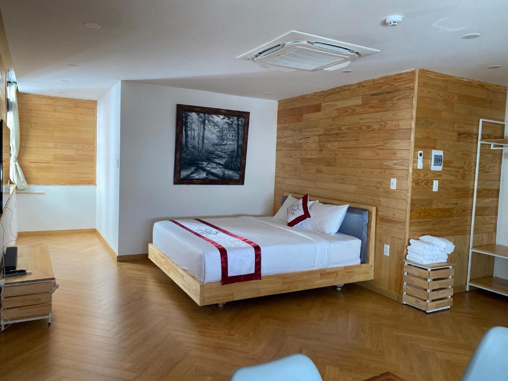 Giường trong phòng chung tại Feliz Dalat Homestay