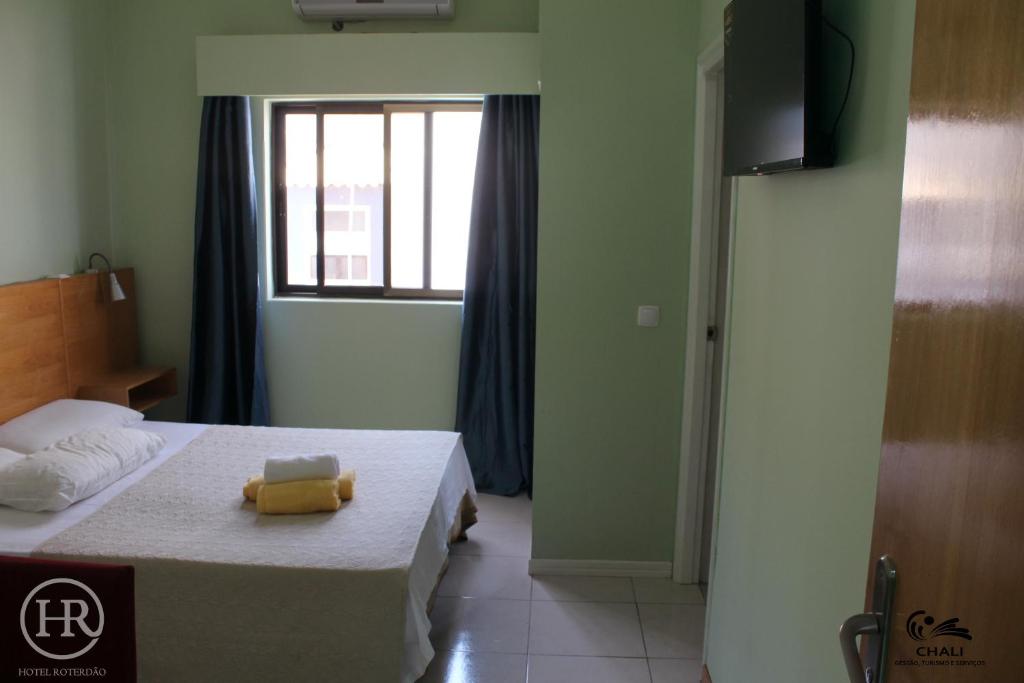 Postel nebo postele na pokoji v ubytování Hotel Roterdão "Under New Management"