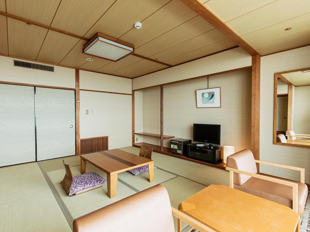 TV a/nebo společenská místnost v ubytování KAMENOI HOTEL Awajishima