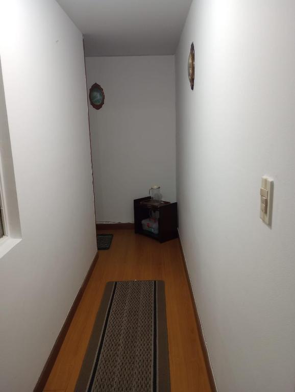 TV a/nebo společenská místnost v ubytování Habitaciones C&S Bogotá