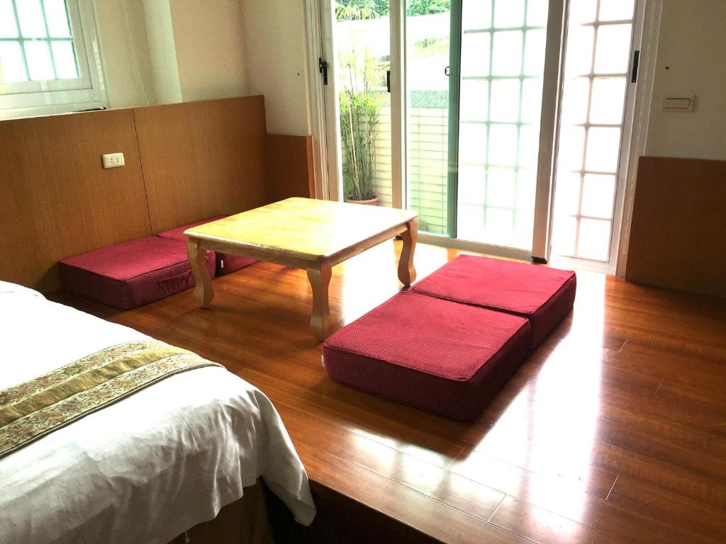 Postel nebo postele na pokoji v ubytování Shan Quan Zhi Lian Homestay