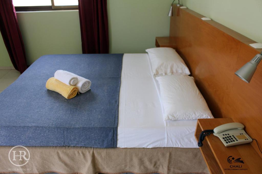 Postel nebo postele na pokoji v ubytování Hotel Roterdão "Under New Management"