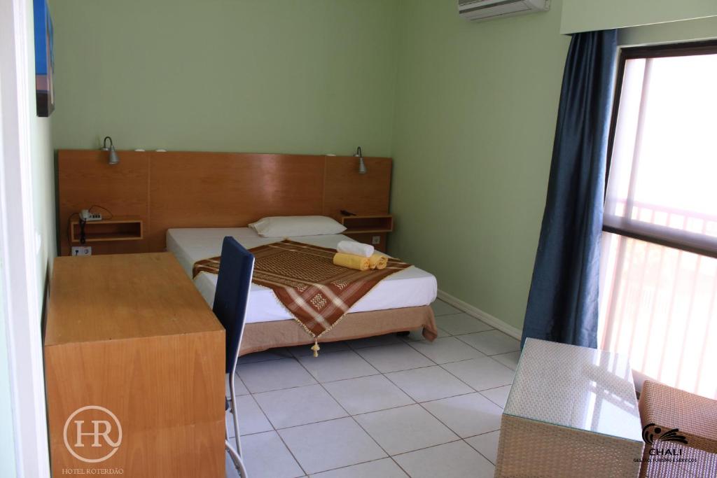Postel nebo postele na pokoji v ubytování Hotel Roterdão "Under New Management"