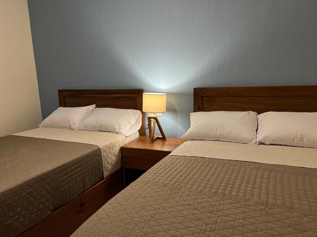 Postel nebo postele na pokoji v ubytování Casona 1530