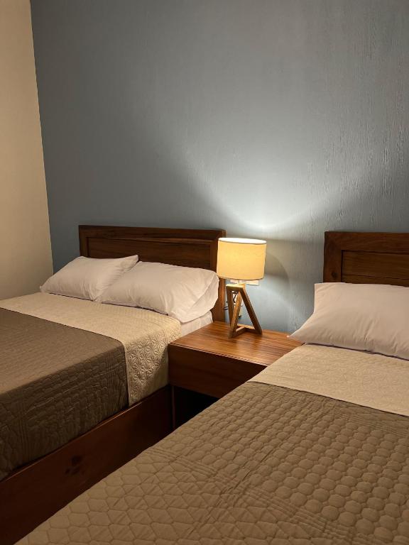 Postel nebo postele na pokoji v ubytování Casona 1530
