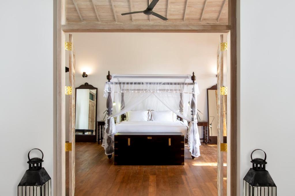 Postel nebo postele na pokoji v ubytování Haritha Villas & Spa