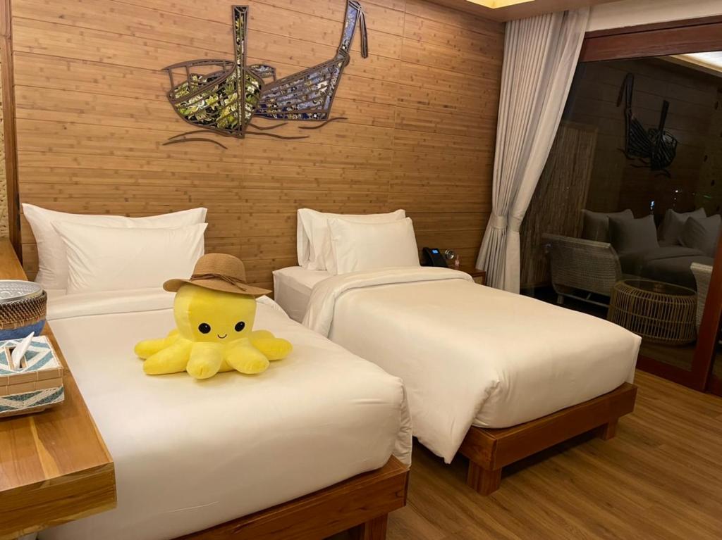 Sinae Phuket - SHA Extra Plusにあるベッド