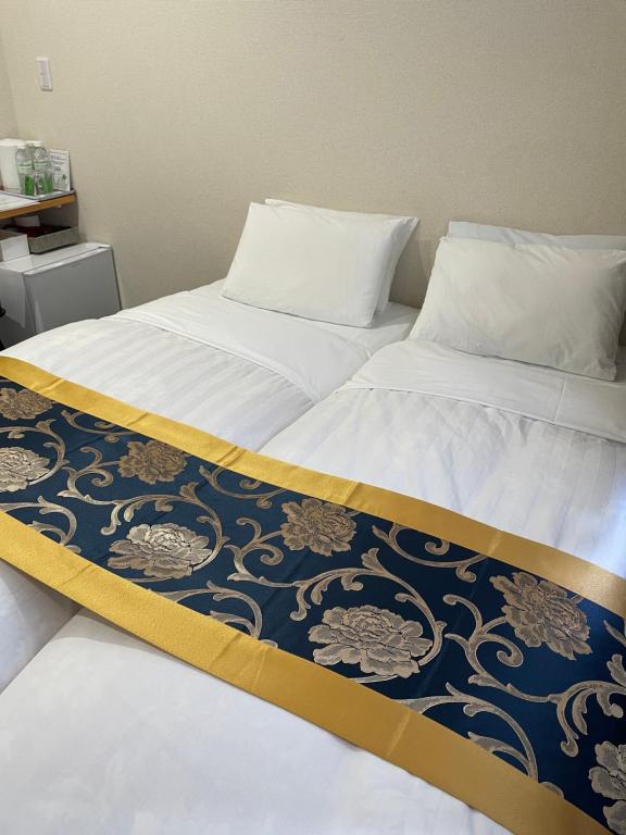 Postel nebo postele na pokoji v ubytování Karin doo Hotel