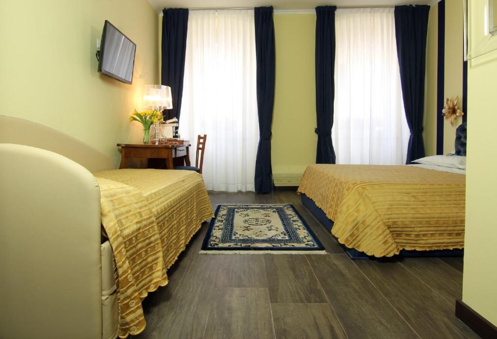 Postel nebo postele na pokoji v ubytování Albergo Al Viale