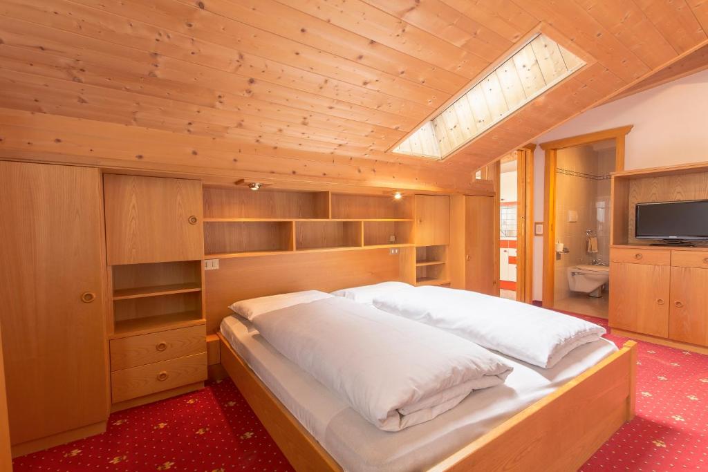 Postel nebo postele na pokoji v ubytování B&B Apartments La Palsa