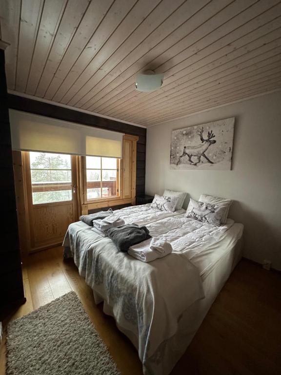 Кровать или кровати в номере Villa Utsuntuisku