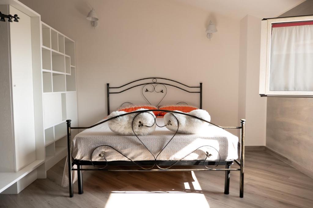 Postel nebo postele na pokoji v ubytování Agriturismo Casa Chiara