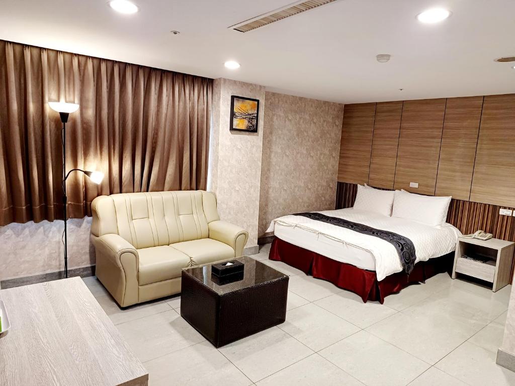 Postel nebo postele na pokoji v ubytování Sa-Yo Hotel - Pier 2