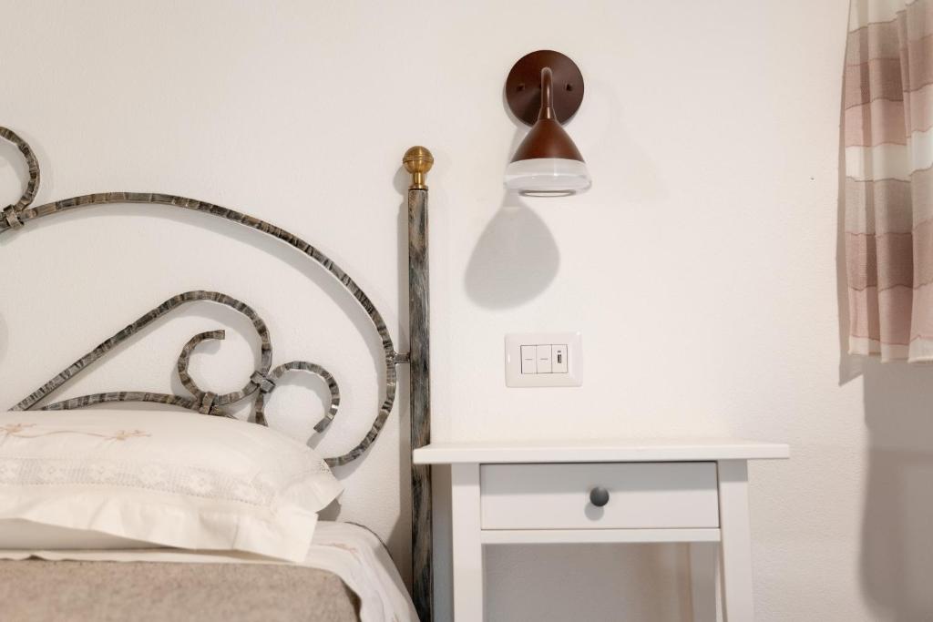 Postel nebo postele na pokoji v ubytování Agriturismo Casa Chiara