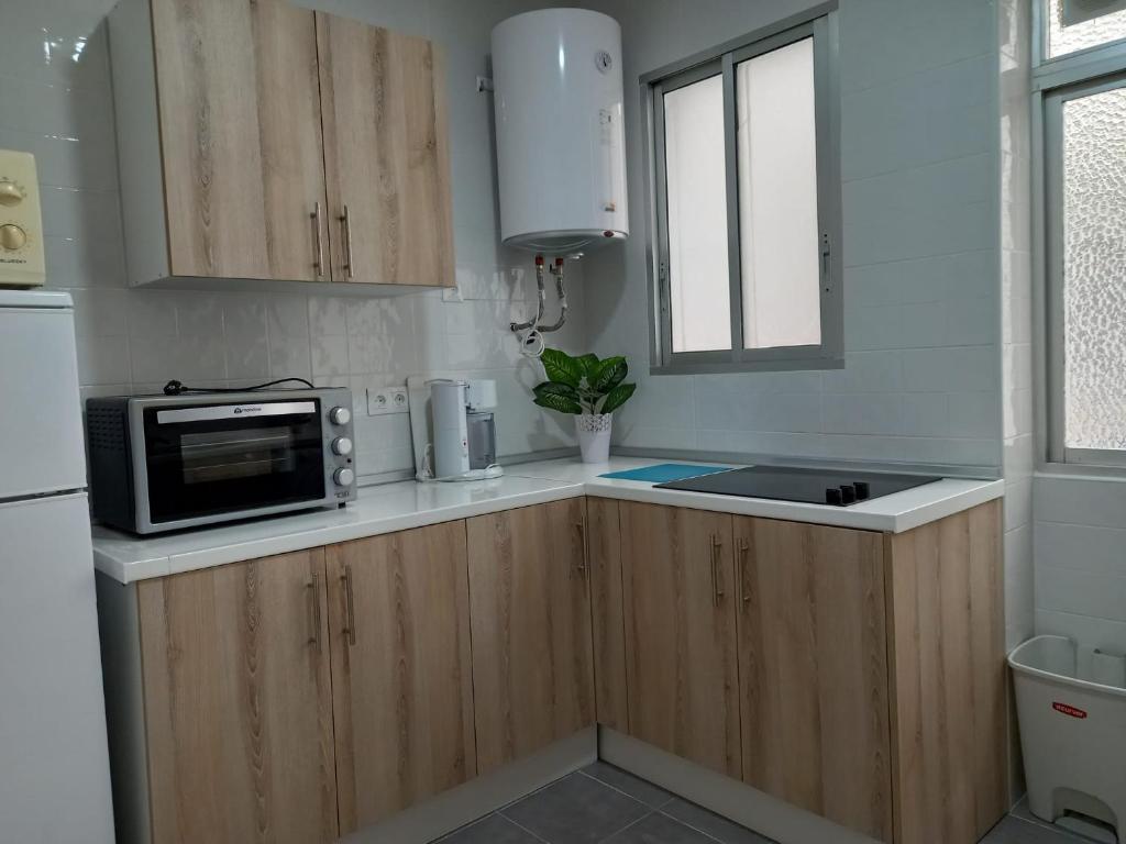Kuchnia lub aneks kuchenny w obiekcie Centric apartment in Malaga
