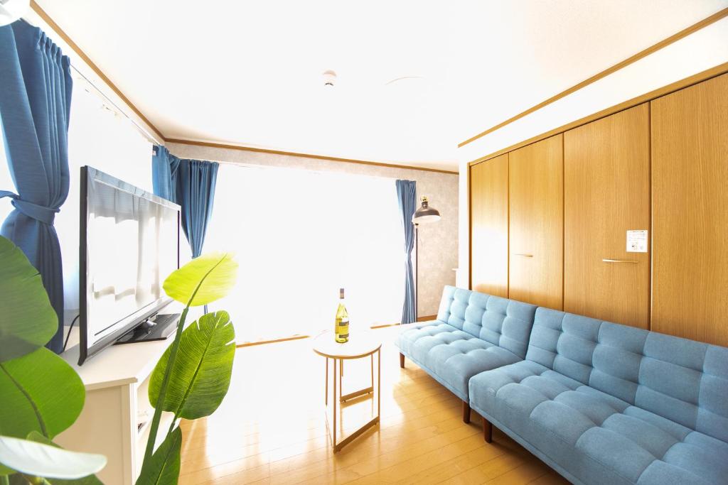 Posezení v ubytování Yokkaichi Motomachi Hotel