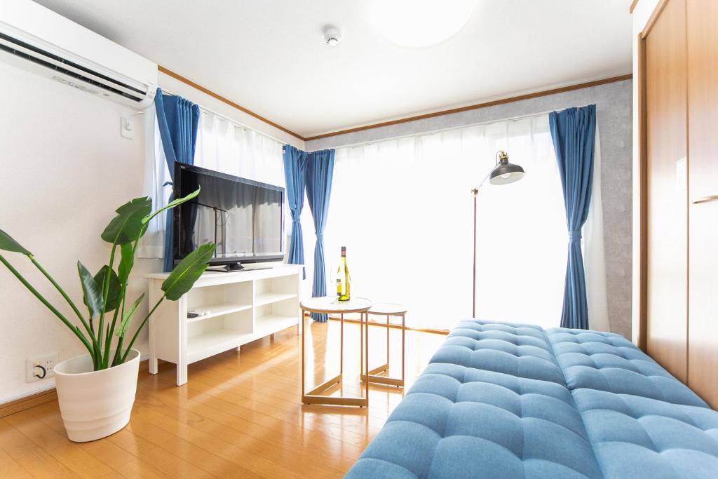 Posezení v ubytování Yokkaichi Motomachi Hotel