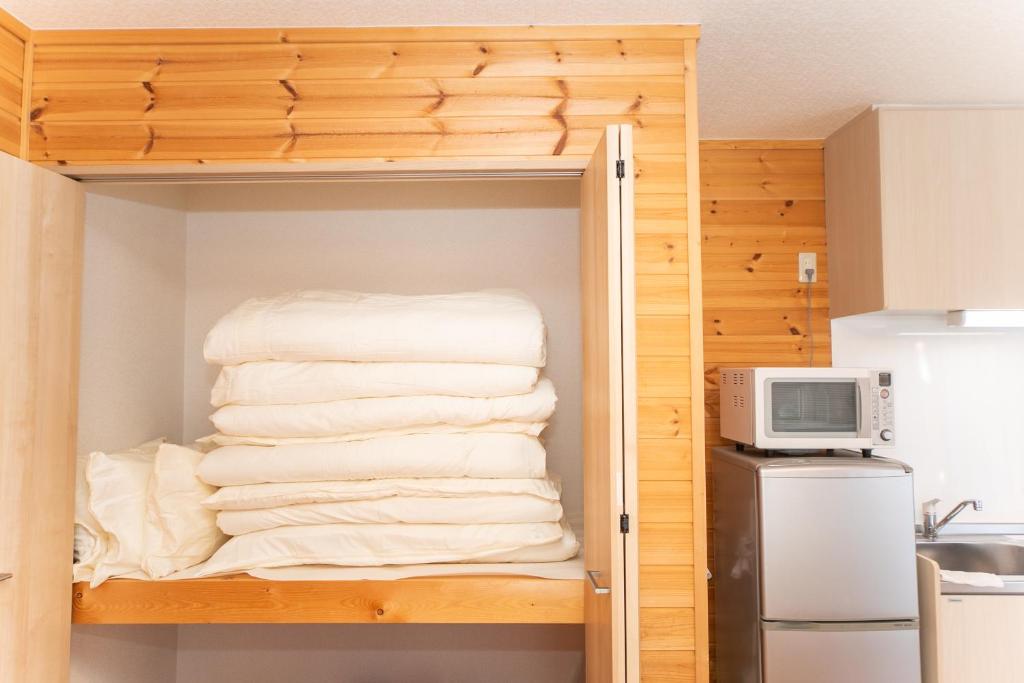 Kuchyň nebo kuchyňský kout v ubytování Yokkaichi Motomachi Hotel