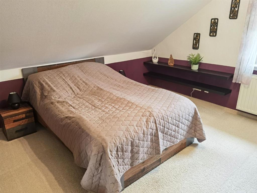 Postel nebo postele na pokoji v ubytování Ländliche Idylle in Hochfranken