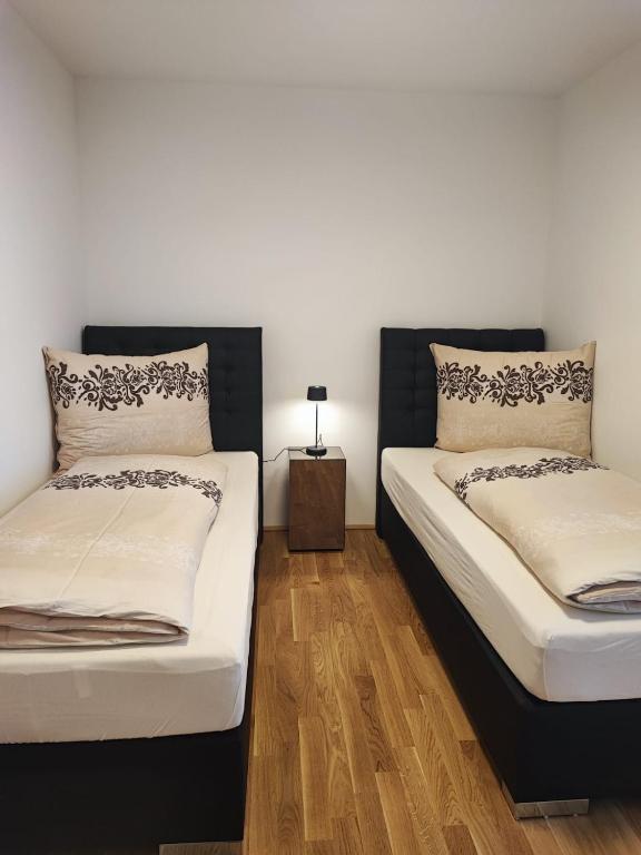 Postel nebo postele na pokoji v ubytování Wohlfühlapartments in Hard