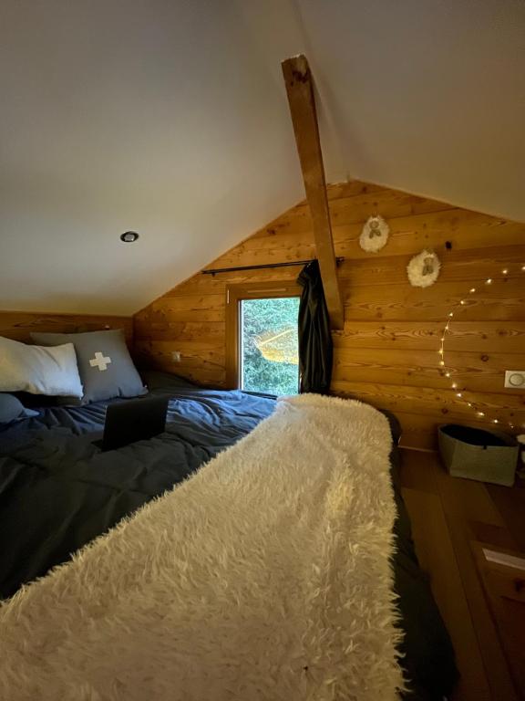 Postel nebo postele na pokoji v ubytování CHALET MONT BLANC