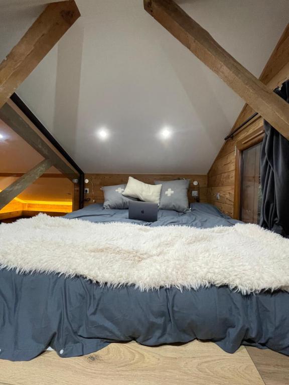 Postel nebo postele na pokoji v ubytování CHALET MONT BLANC
