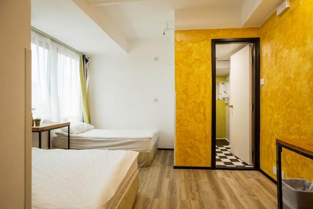 Letto o letti in una camera di Yesinn @YMT