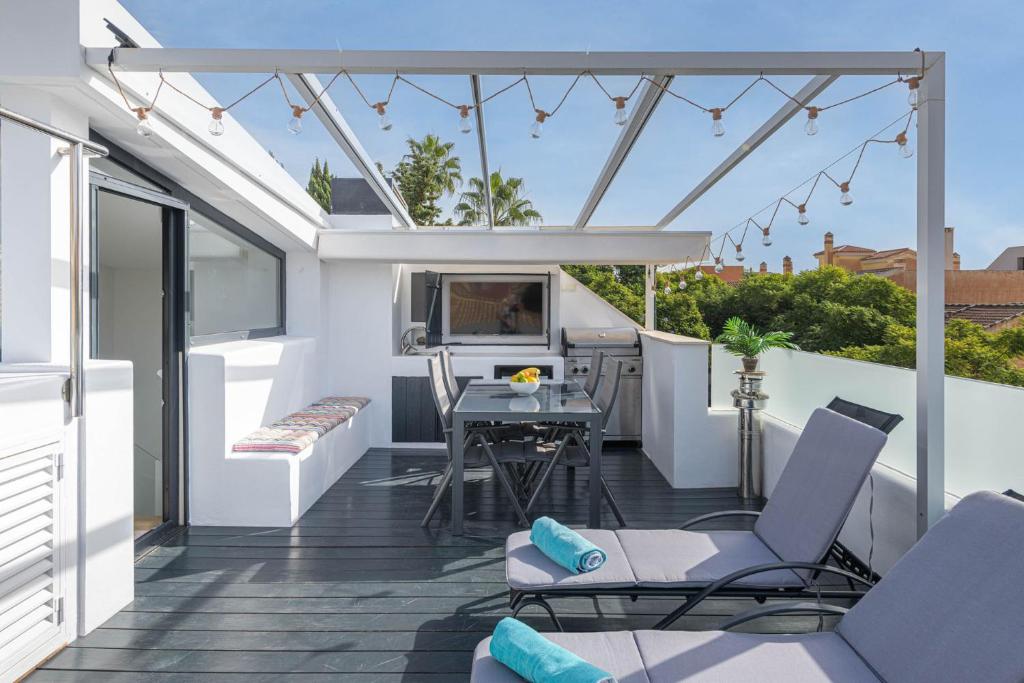 Posedenie v ubytovaní Carmen Beach House in Malaga by Solaga Holiday Homes
